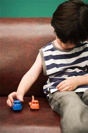 simsearch:632-03424261,k - Child playing with toy cars Stock Photo - Premium Royalty-Free, Code: 632-03424653
