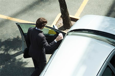 simsearch:632-03083042,k - Businessman getting into car Stock Photo - Premium Royalty-Free, Code: 632-03500873