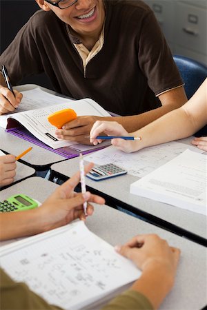 school book - High school students studying together, cropped Stock Photo - Premium Royalty-Free, Code: 632-03516539