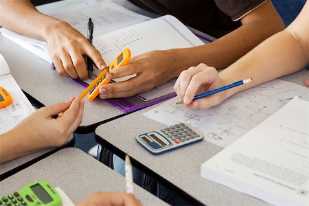 Students studying math together Stock Photo - Premium Royalty-Free, Code: 632-03516541