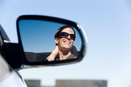 simsearch:632-05401320,k - Woman passenger in car, reflection in side-view mirror Foto de stock - Sin royalties Premium, Código: 632-03516881