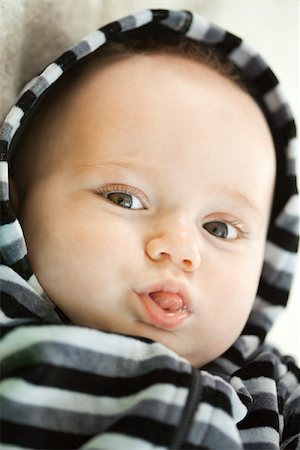 Baby sticking out tongue, portrait Stock Photo - Premium Royalty-Free, Code: 632-03630044