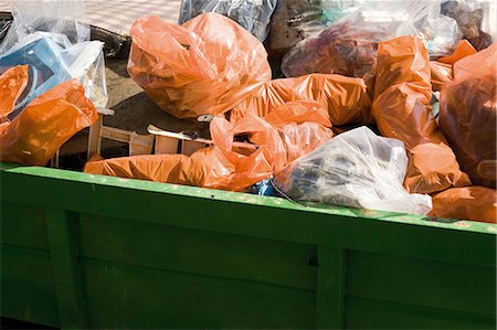 Dumpster full of garbage bags Stock Photo - Premium Royalty-Free, Code: 632-03651704
