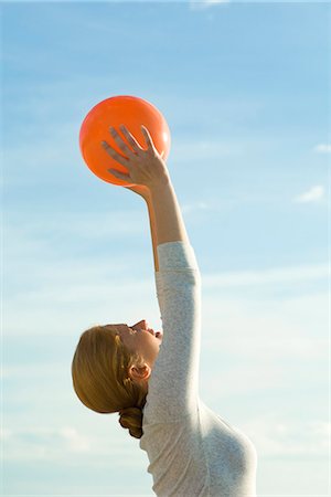 exercise ball - Woman stretching with fitness ball Stock Photo - Premium Royalty-Free, Code: 632-03651842