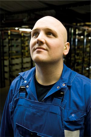 Young factory worker in carpet tile factory, portrait Stock Photo - Premium Royalty-Free, Code: 632-03754531