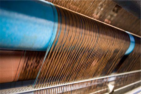 Loom weaving carpet in carpet tile factory Stock Photo - Premium Royalty-Free, Code: 632-03754599