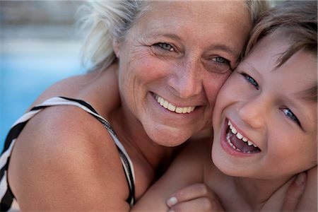 Grandmother and grandson laughing together outdoors, portrait Stock Photo - Premium Royalty-Free, Code: 632-03779299