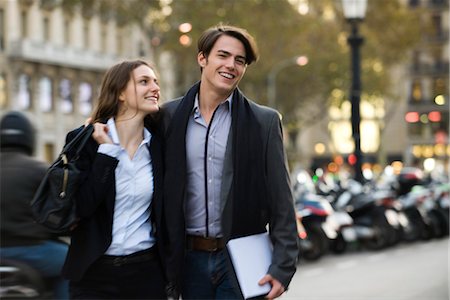 Couple crossing street together Stock Photo - Premium Royalty-Free, Code: 632-03779700