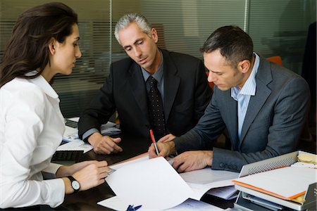 people and bank - Executives signing paperwork in office Stock Photo - Premium Royalty-Free, Code: 632-03848030