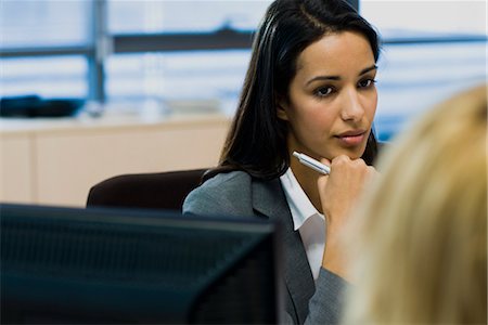 Businesswoman in meeting Stock Photo - Premium Royalty-Free, Code: 632-03848056