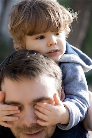 simsearch:632-03848361,k - Toddler boy covering father's eyes with his hands, portrait Stock Photo - Premium Royalty-Free, Code: 632-03848268