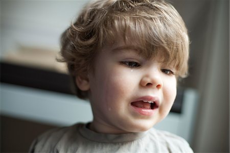 Toddler boy crying, portrait Stock Photo - Premium Royalty-Free, Code: 632-03848356