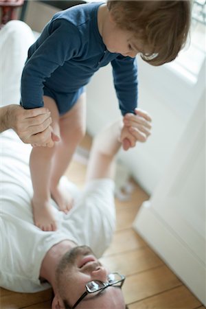 simsearch:632-03848361,k - Father playing with toddler boy Stock Photo - Premium Royalty-Free, Code: 632-03848379