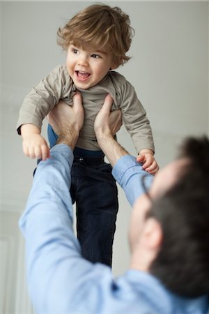 simsearch:632-03848361,k - Father holding up toddler son Stock Photo - Premium Royalty-Free, Code: 632-03848408