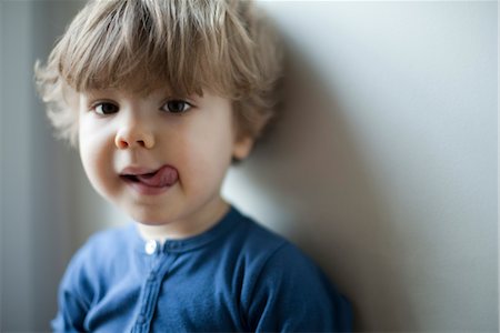 simsearch:632-05554011,k - Little boy sticking out tongue, portrait Stock Photo - Premium Royalty-Free, Code: 632-03848402