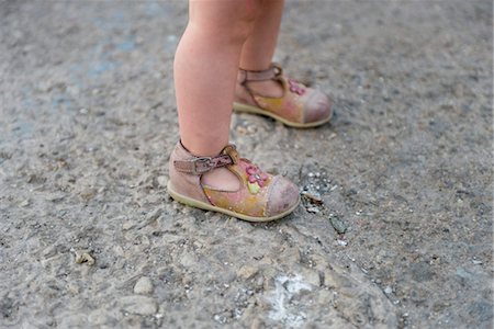 Baby girl's legs and shoes, cropped Stock Photo - Premium Royalty-Free, Code: 632-03897835