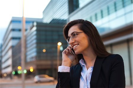 simsearch:632-05401320,k - Business woman talking on cell phone, portrait Stock Photo - Premium Royalty-Free, Code: 632-03898082