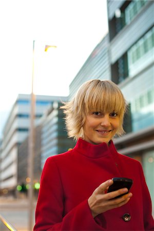 simsearch:632-05401320,k - Young woman using cell phone, portrait Stock Photo - Premium Royalty-Free, Code: 632-03898208