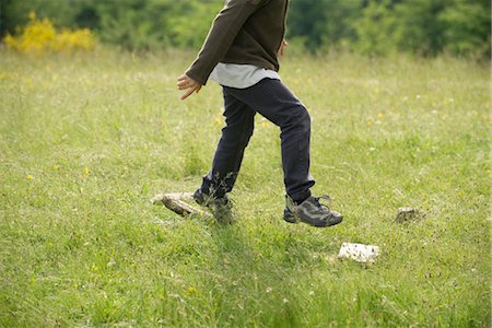 simsearch:633-05401710,k - Boy running in field, low section Stock Photo - Premium Royalty-Free, Code: 633-05402086