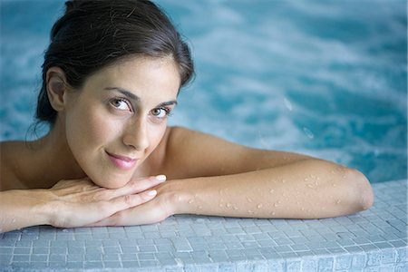 simsearch:6108-06907511,k - Woman relaxing in jacuzzi Stock Photo - Premium Royalty-Free, Code: 633-08639031