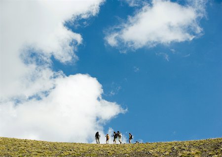 people walking in the distance - Hikers, low angle view Stock Photo - Premium Royalty-Free, Code: 633-01272556