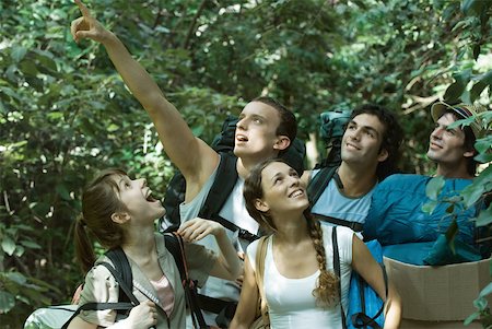 simsearch:633-01715612,k - Group of wilderness campers carrying equipment, looking up Stock Photo - Premium Royalty-Free, Code: 633-01573773