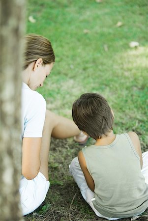 simsearch:633-05401710,k - Mother and son sitting outdoors, playing together, rear view Stock Photo - Premium Royalty-Free, Code: 633-01715017