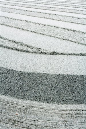 simsearch:633-01715488,k - Patterns raked in gravel, close-up Stock Photo - Premium Royalty-Free, Code: 633-02044285