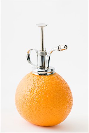 Orange perfume spray Stock Photo - Premium Royalty-Free, Code: 633-02044450
