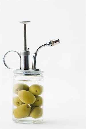 Spray bottle with olives inside Stock Photo - Premium Royalty-Free, Code: 633-02231634