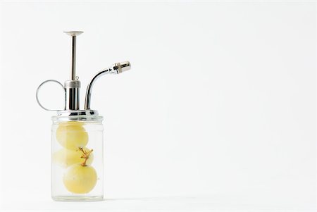 Spray bottle with white grapes inside Stock Photo - Premium Royalty-Free, Code: 633-02231640