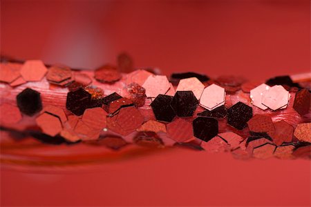 simsearch:633-02418107,k - Christmas decoration covered in red sequins, extreme close-up Stock Photo - Premium Royalty-Free, Code: 633-02418054