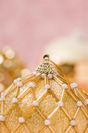 simsearch:614-02241057,k - Ornate gold Christmas ornament, close-up Stock Photo - Premium Royalty-Free, Code: 633-02418099