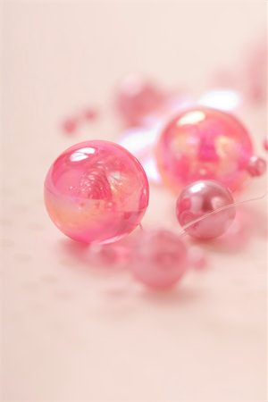 simsearch:633-02418107,k - Decorative pink beads, close-up Stock Photo - Premium Royalty-Free, Code: 633-02418100