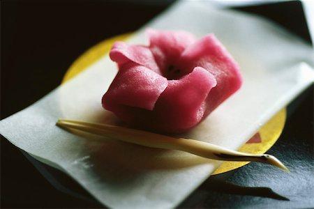 Single pink wagashi on plate Stock Photo - Premium Royalty-Free, Code: 633-02885679