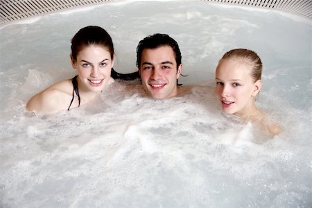simsearch:644-01436677,k - One man with two woman  in jacuzzi at a spa Stock Photo - Premium Royalty-Free, Code: 644-01435687
