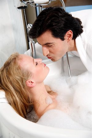 Couple enjoying bubble bath Stock Photo - Premium Royalty-Free, Code: 644-01436120