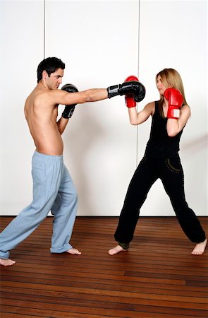 simsearch:644-01436949,k - Straight right-hand punch of Active Tae Bo and inside block Stock Photo - Premium Royalty-Free, Code: 644-01436493