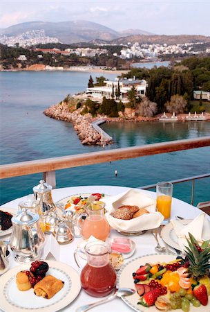 simsearch:649-02054287,k - Breakfast table with view to sea Stock Photo - Premium Royalty-Free, Code: 644-01436614