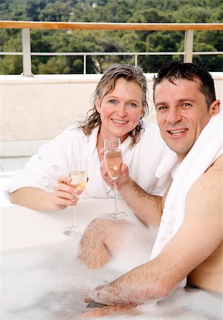 Mature couple having fun in the bathtub Stock Photo - Premium Royalty-Free, Code: 644-01436776