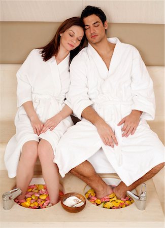 simsearch:644-01436677,k - A young couple enjoying a foot bath with rose petals Stock Photo - Premium Royalty-Free, Code: 644-01436983