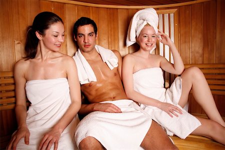 friend spa - A man and two young women relaxing at a spa  together Stock Photo - Premium Royalty-Free, Code: 644-01437117