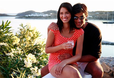 flowers greece - Couple sitting together with sea view Stock Photo - Premium Royalty-Free, Code: 644-01437286
