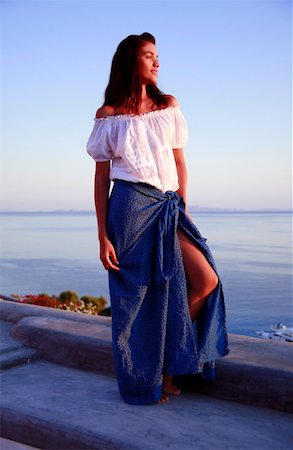 french colors scarf - Woman posing on terrace with a view Stock Photo - Premium Royalty-Free, Code: 644-01437287