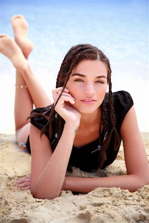 Closeup of young woman on beach Stock Photo - Premium Royalty-Free, Code: 644-01437551