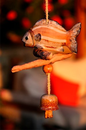 Fish wind chime Stock Photo - Premium Royalty-Free, Code: 644-01437815