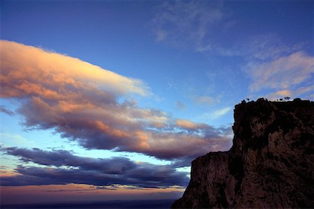 silhouette mountain peak - Cliffside with sunset sky Stock Photo - Premium Royalty-Free, Code: 644-01630805