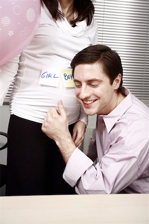 people having sex - Office worker guessing the sex of colleague's baby Stock Photo - Premium Royalty-Free, Code: 644-01825270