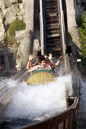 rollercoaster teenagers - Teenagers on amusement park ride Stock Photo - Premium Royalty-Free, Code: 644-01825737