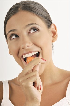simsearch:644-02153088,k - Female young adult eating a lollipop Stock Photo - Premium Royalty-Free, Code: 644-02152688